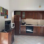 La Casa Gialla * Кала-Гононе