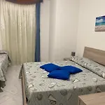 Апартаменты La Casa Gialla Кала-Гононе